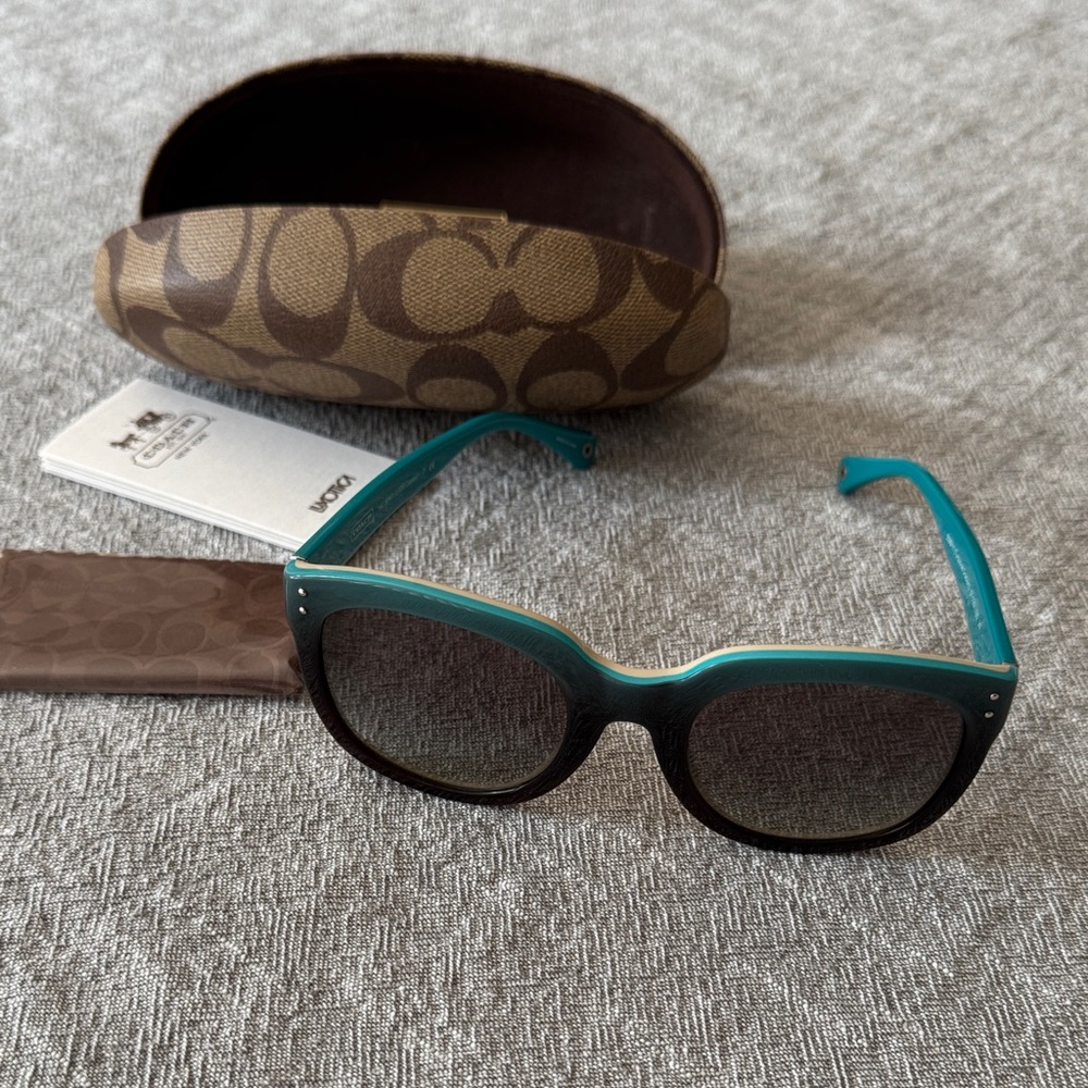 Coach sunglasses. Turquoise/black frame
